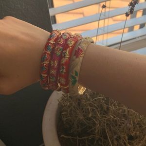 Gold colored designed bracelets